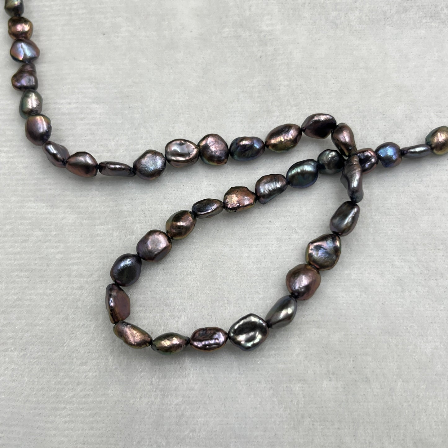 Fresh Water Pearl, Peacock Color Tumble Shape, 6-7 MM Size, AA Luster Pearl