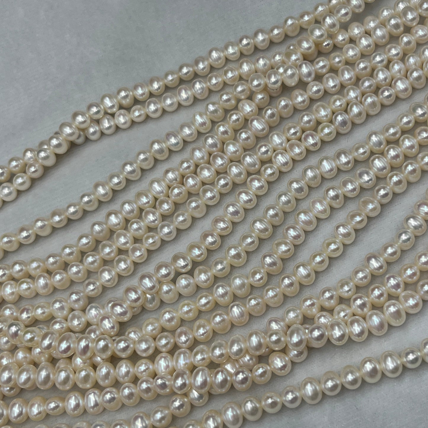 Freshwater Pearl, White Color, Oval Shape, 7 MM Size