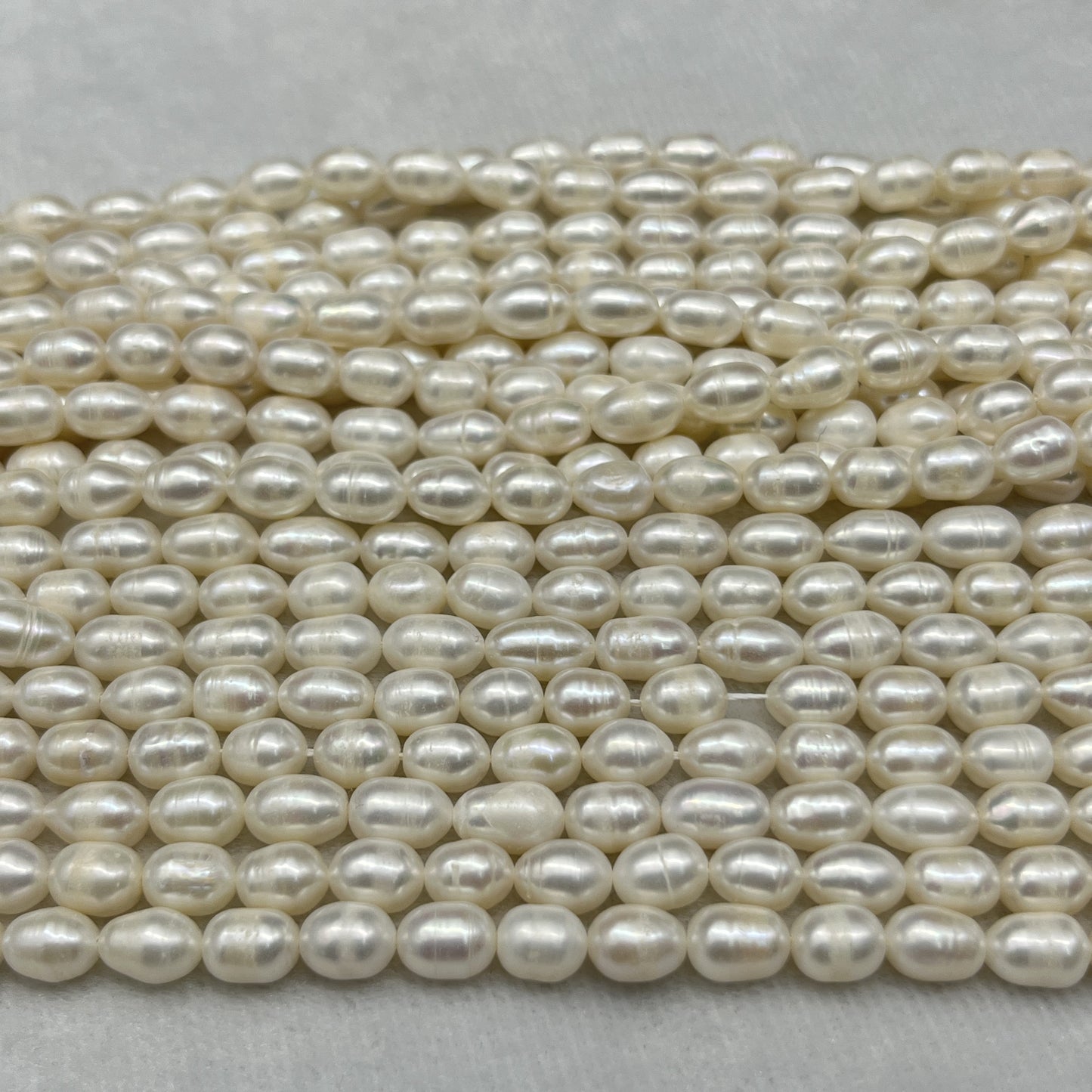 Fresh Water Pearl White Color, Rice Shape, A Luster Pearl, 6-7 MM Size