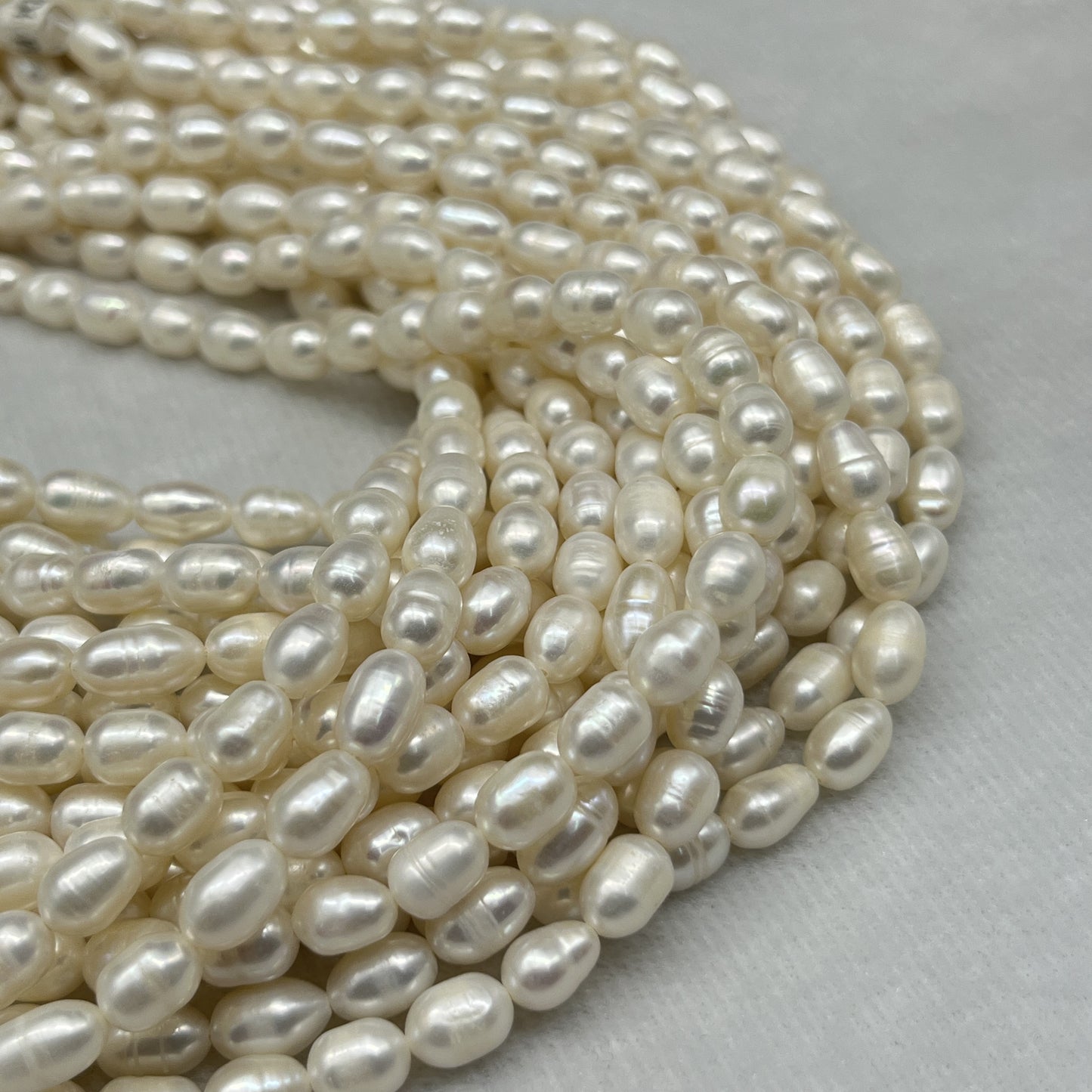 Fresh Water Pearl White Color, Rice Shape, A Luster Pearl, 6-7 MM Size