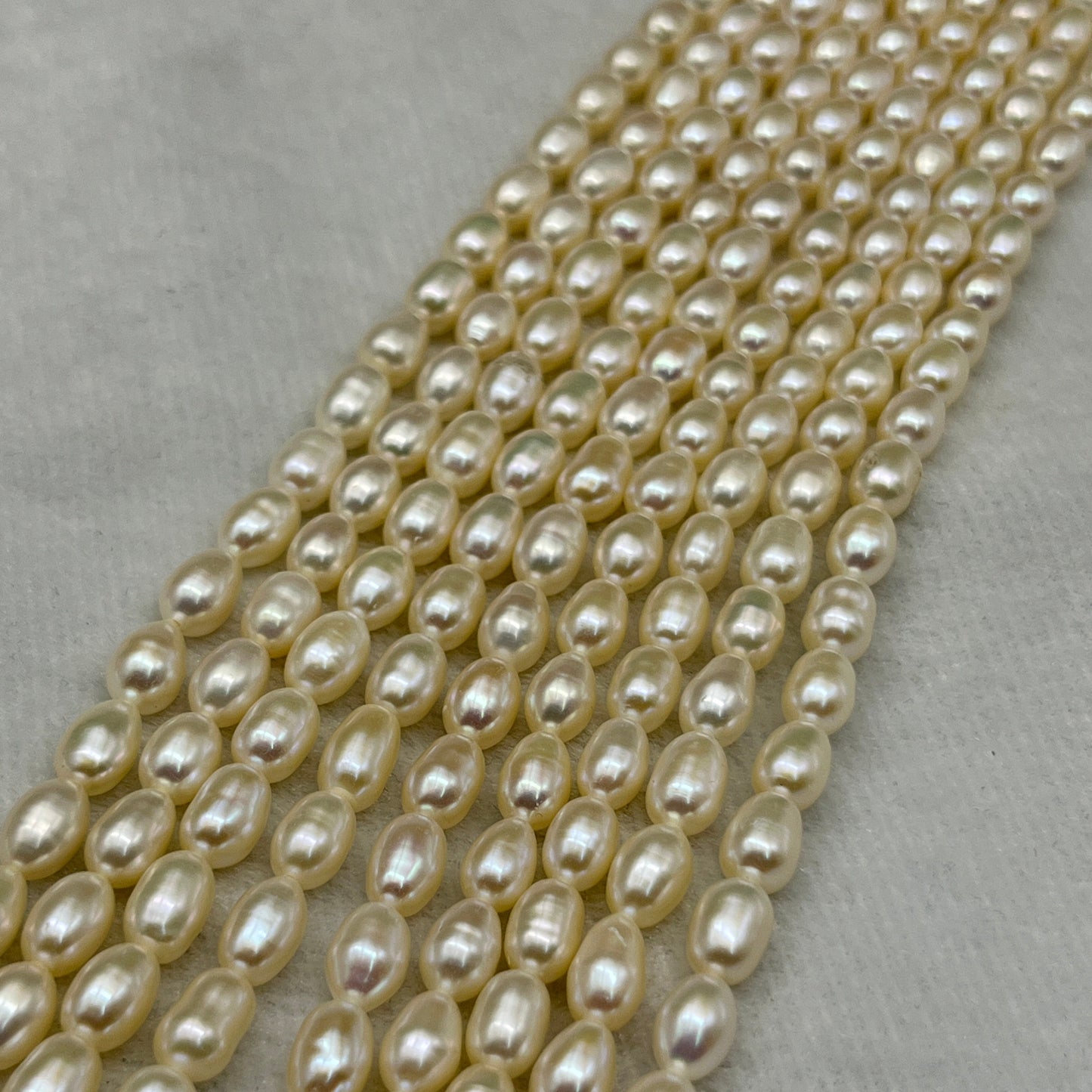 Fresh Water Pearl Cream Color, Rice Shape, AA Luster Pearl, 5-5.5 MM Size