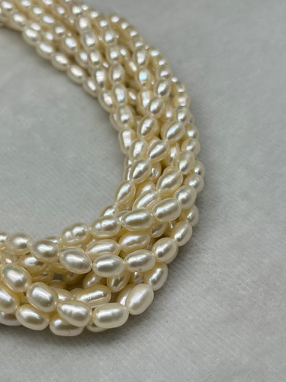 Fresh Water Pearl Cream Color, Rice Shape, AA Luster Pearl, 5-5.5 MM Size