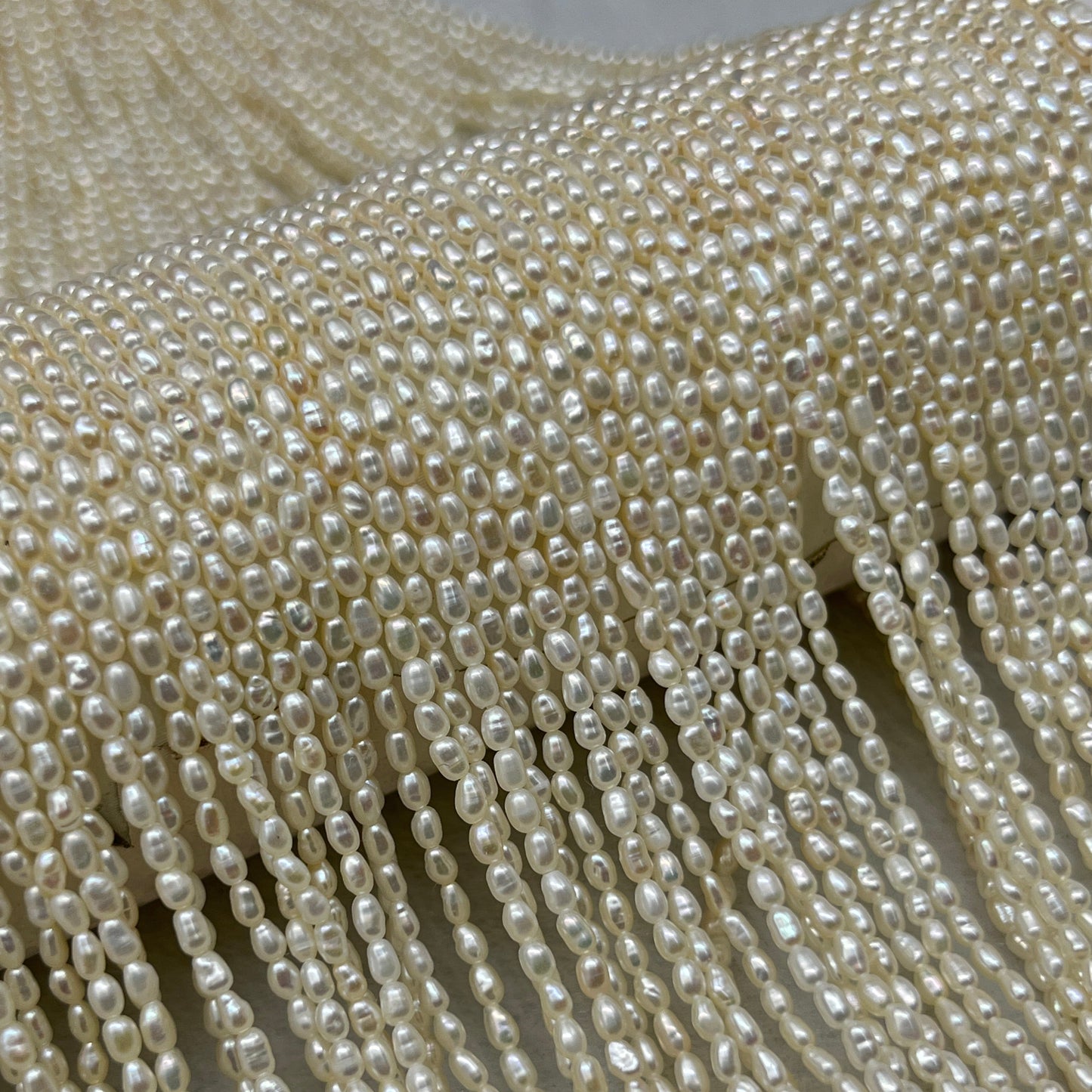 Fresh Water Pearl Off White Color, Rice Shape, AAA Luster Pearl, 2 MM Size