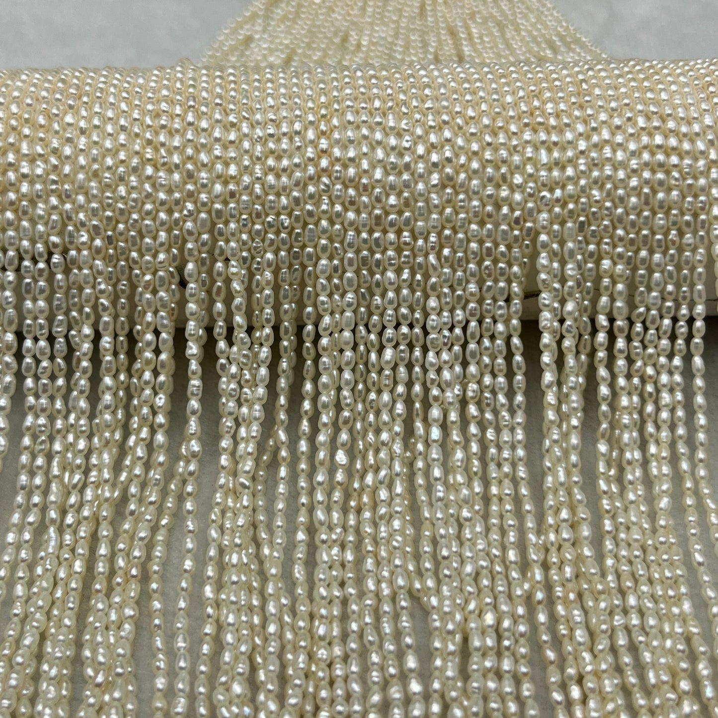 Fresh Water Pearl Off White Color, Rice Shape, AAA Luster Pearl, 2 MM Size