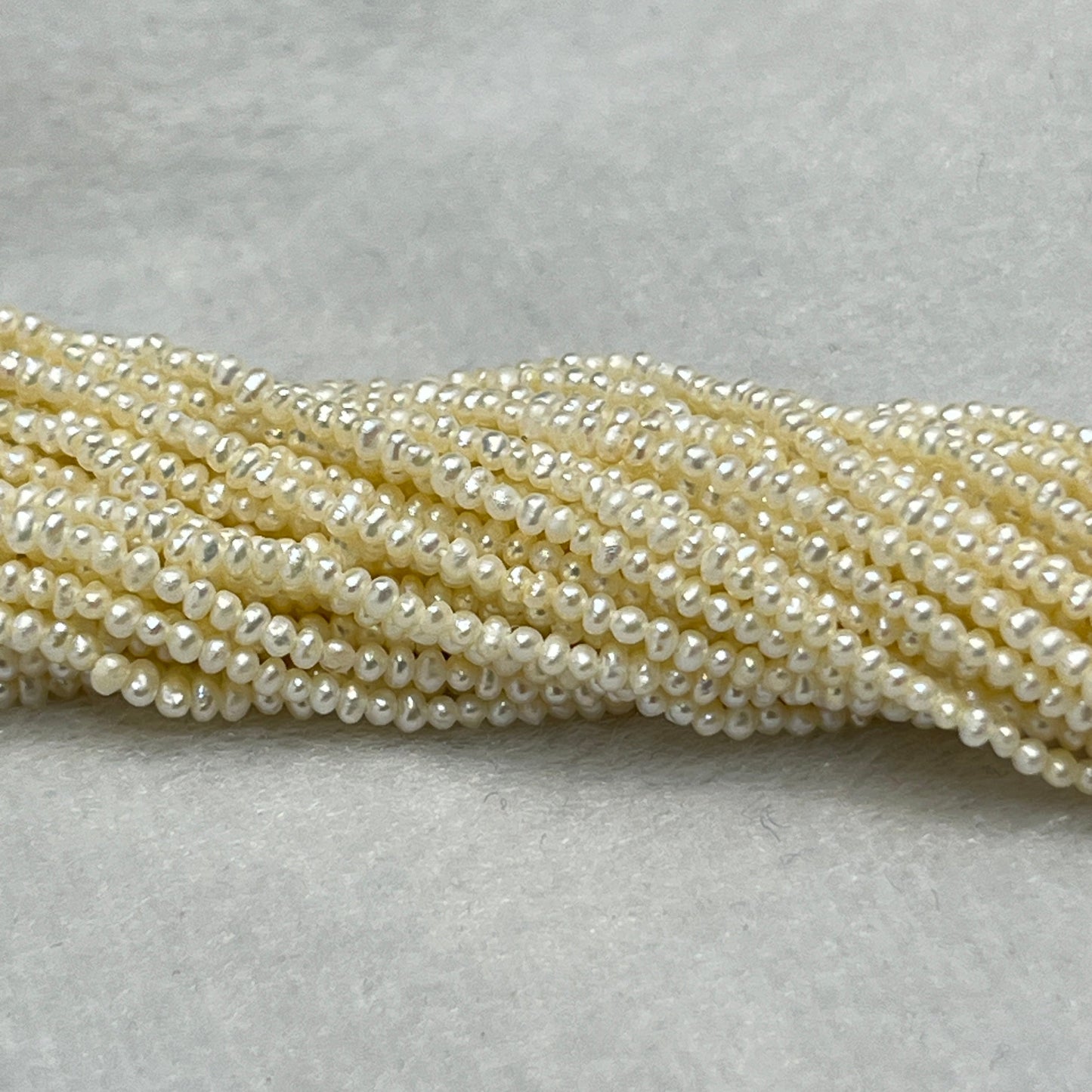 Fresh Water Pearl, Cream Color, Near Round Shape, 1.9 MM Size