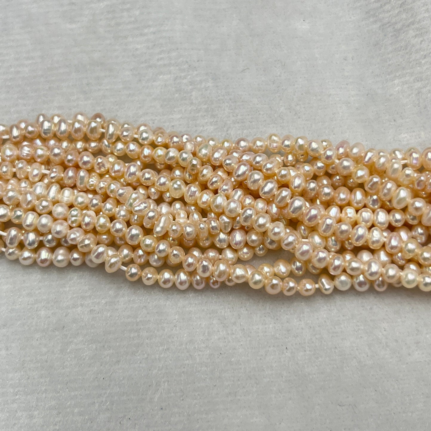 Fresh Water Pearl Peach Color, Potato Shape, AA Luster Pearl, 3-3.5 MM Size