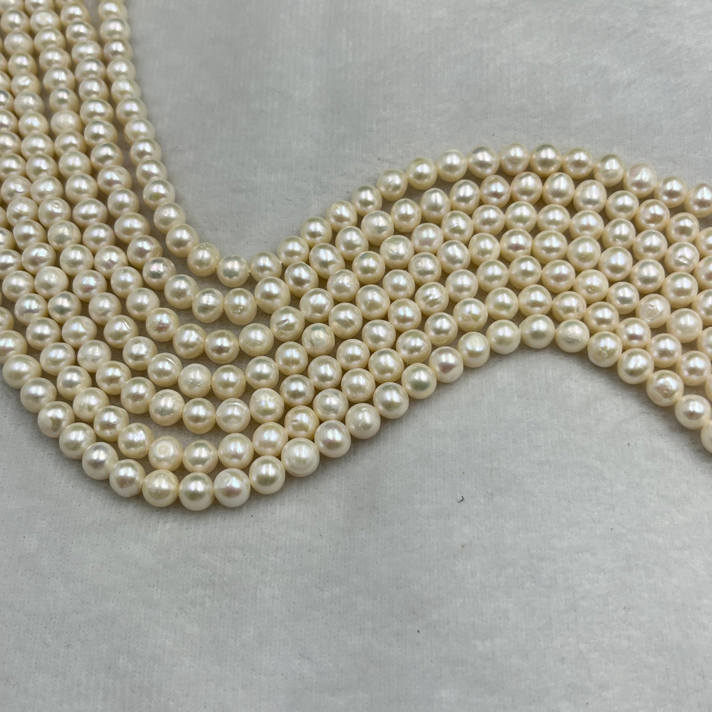 Fresh Water Pearl, White Color Oval Shape, 7MM Size, AA Luster Pearl