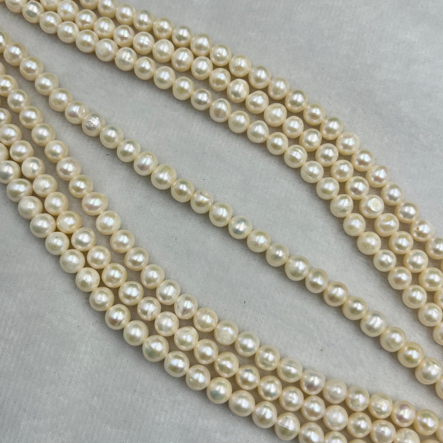 Fresh Water Pearl, White Color Oval Shape, 7MM Size, AA Luster Pearl