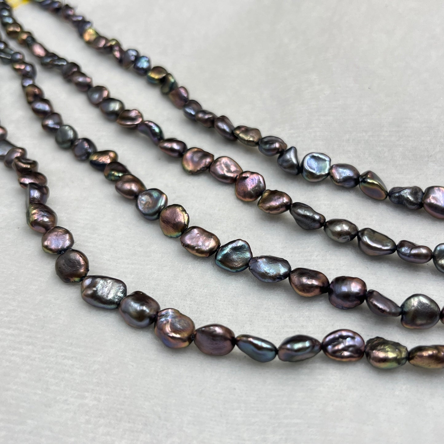 Fresh Water Pearl, Peacock Color Tumble Shape, 6-7 MM Size, AA Luster Pearl