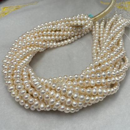 Freshwater Pearl, White Color, Oval Shape, 7 MM Size