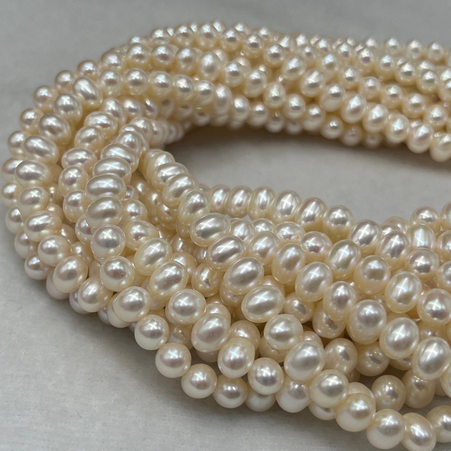 Freshwater Pearl, White Color, Oval Shape, 7 MM Size