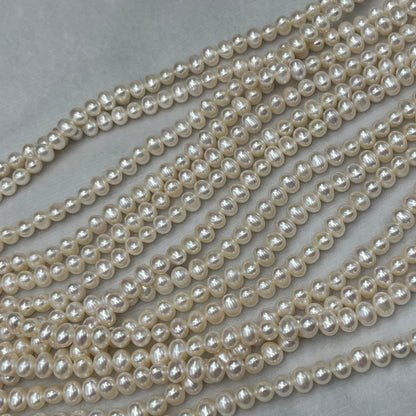 Freshwater Pearl, White Color, Oval Shape, 7 MM Size