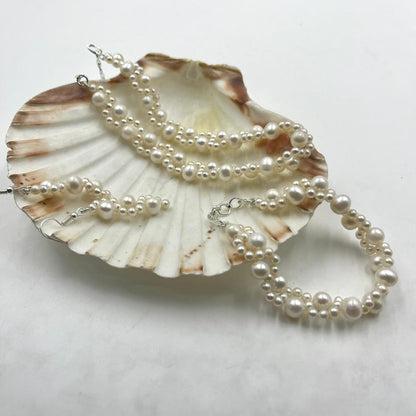 Fresh water pearl necklace with brass bracelet and brass earrings