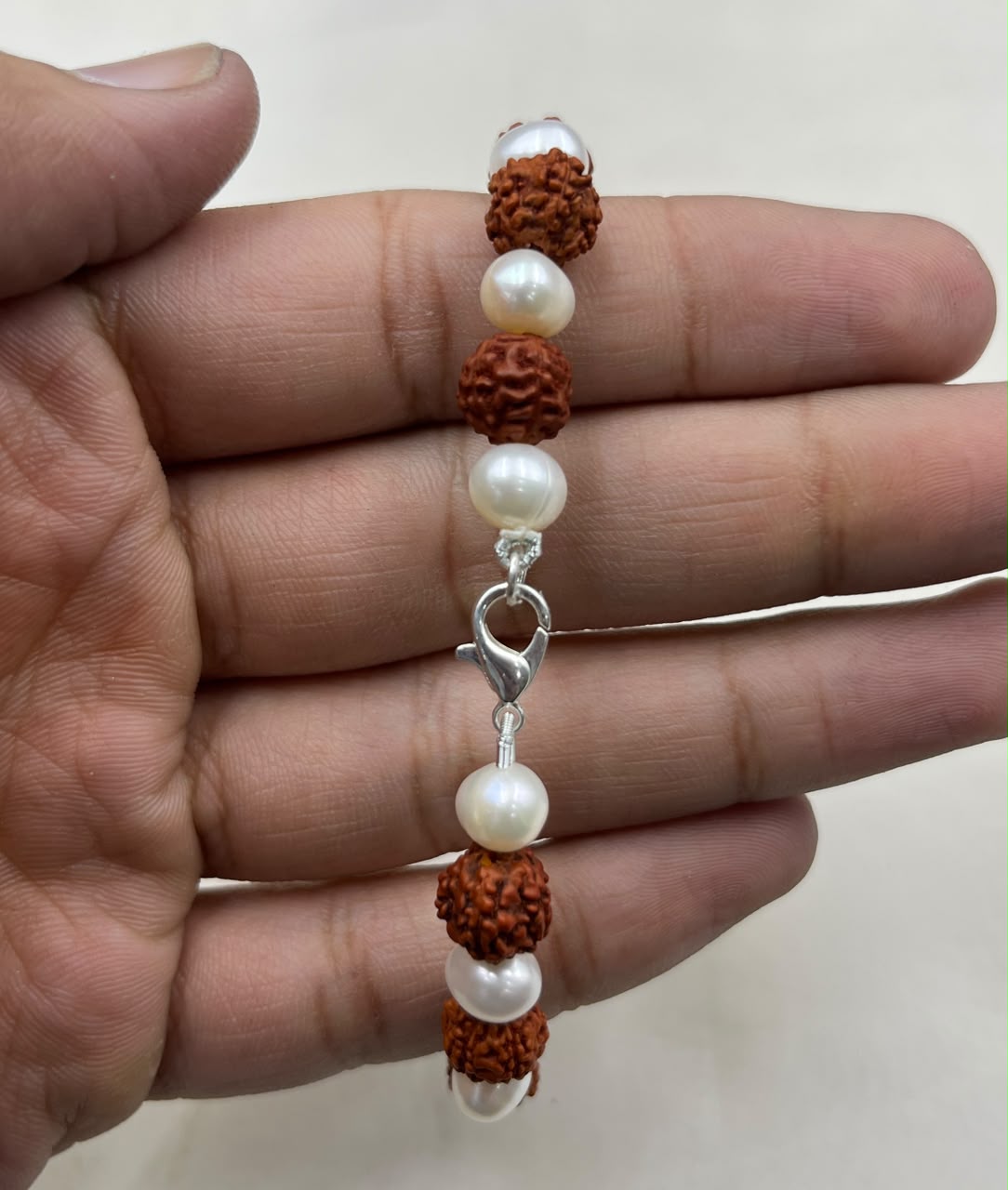 Handcrafted Freshwater Pearl Rakhi | Adjustable Pearl Bracelet | Elegant Raksha Bandhan Gift for Brother